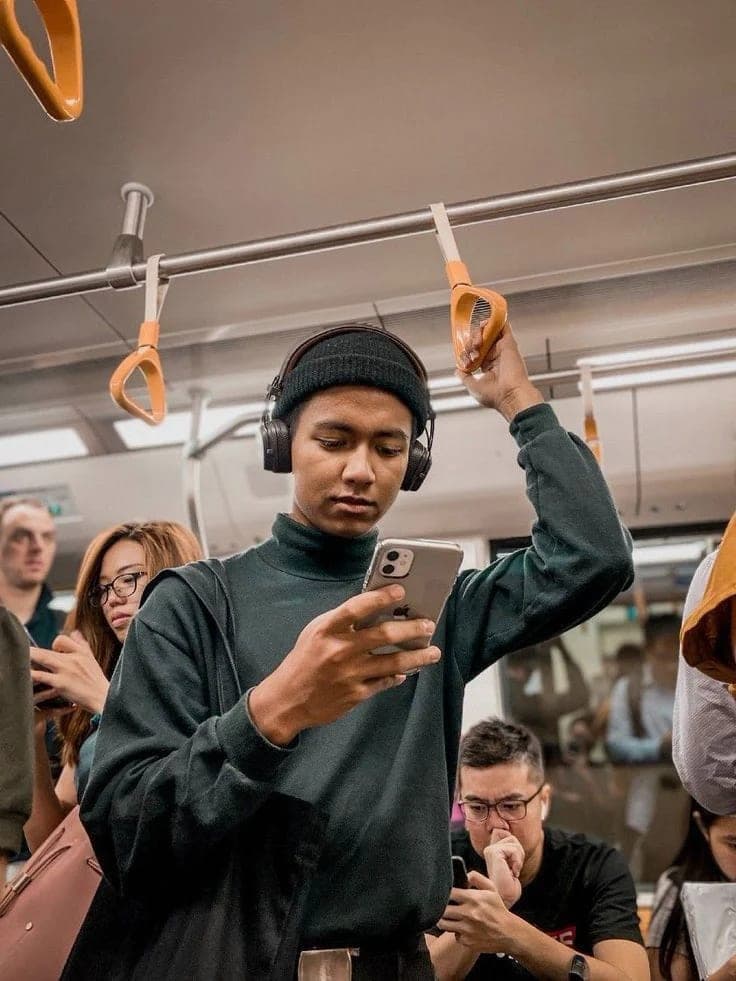 A founder checking a product website on a phone